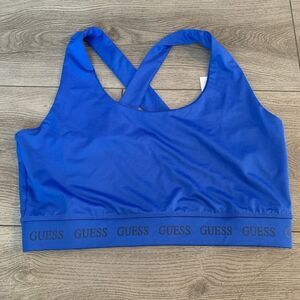 Guess woman’s sport bra with graphic design on bottom band